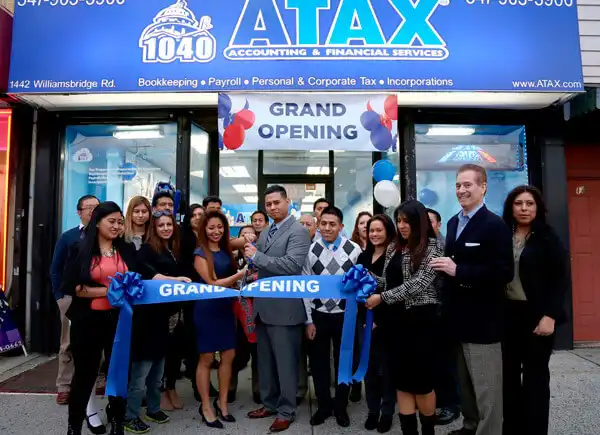 ATAX franchisees and team welcoming the community at a new bilingual tax office opening